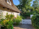 Ferienhaus in Högsdorf - Alte Reetdach-Poststation 1857 - Blick zu anderen Haushälfte