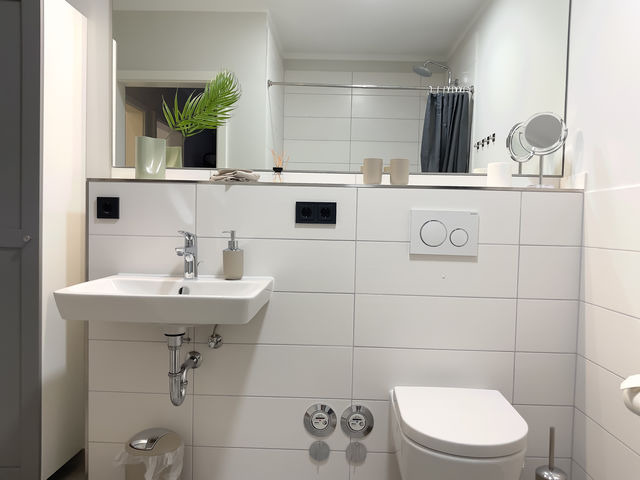 Ferienwohnung in Gr&ouml;mitz - A1 - Haus Deichwind | K&ouml;nigsberger Allee 36 - FERIENDOMIZIL HOLLICH - Bild 9